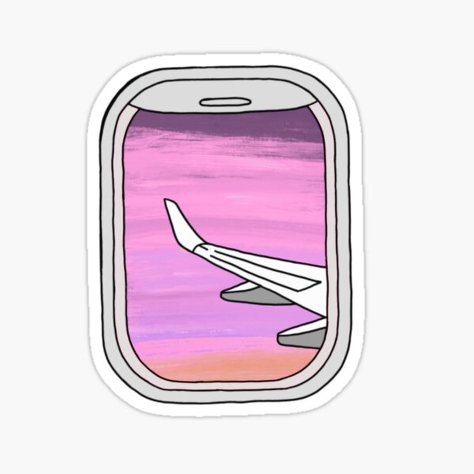 airplane window pink sunset