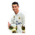 man holding two golden soccer balls and giving the thumbs up sign with both hands