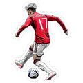 man kicking a soccer ball on top of a white field with the number 17