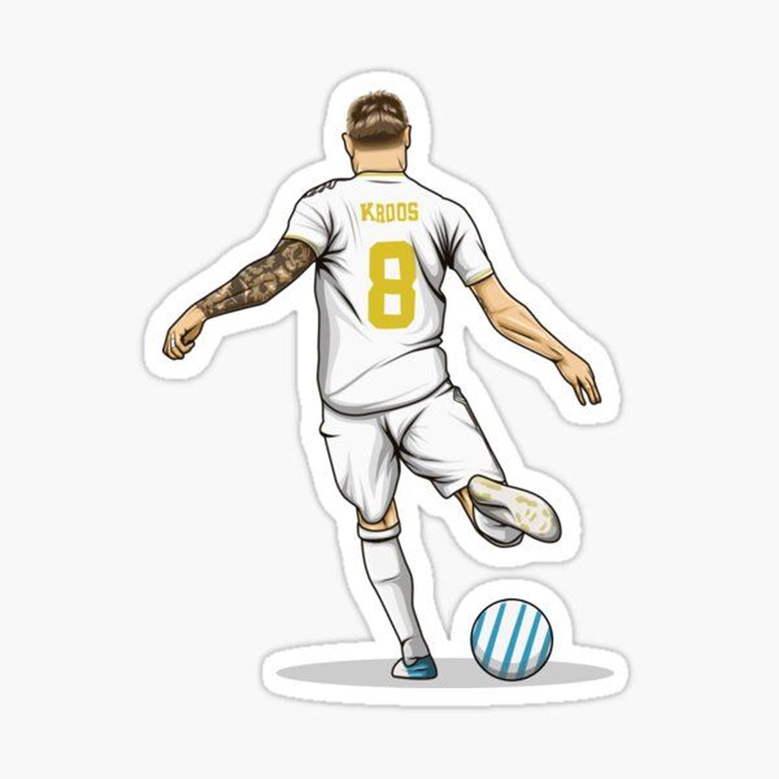 man kicking a soccer ball on top of a white field with the number 8 on it