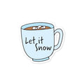 a sticker that says let it snow in a cup